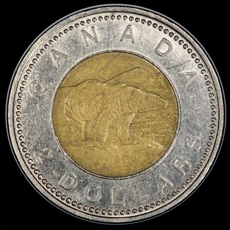 the Ottawa mint released gold and silver-plated loonies and toonies, . . Rare canadian loonies and toonies
